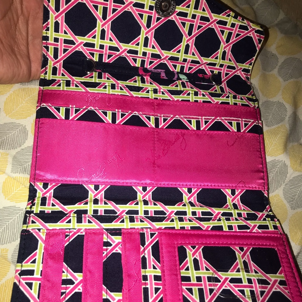 Selling both for $25. Used wallet like new